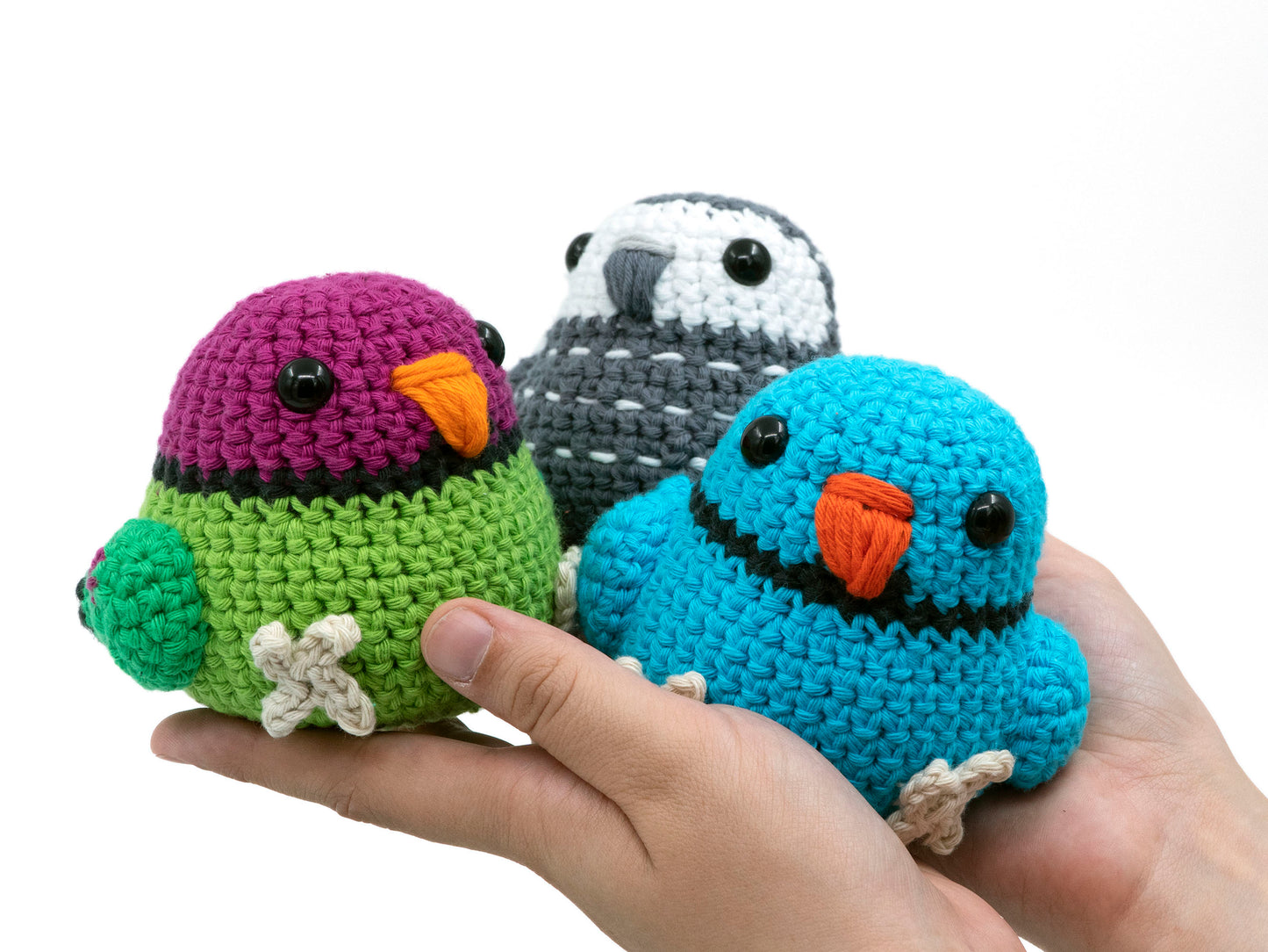 amigurumi crochet parrot pattern bundle with african grey plum-headed parakeet and indian ringneck close up