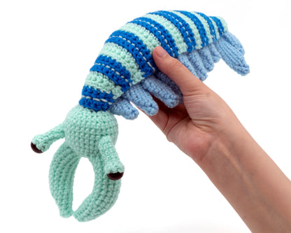 amigurumi crochet anomalocaris being held in hand side view