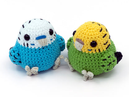 amigurumi crochet budgie pattern blue and green parakeet sitting next to each other
