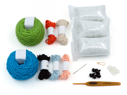 amigurumi crochet indian ringneck kit close up of crochet kit's content